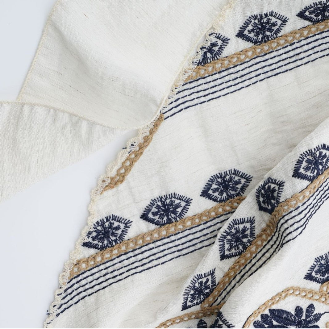 Ivory triangle headscarf with navy geometric embroidery and fabric ties