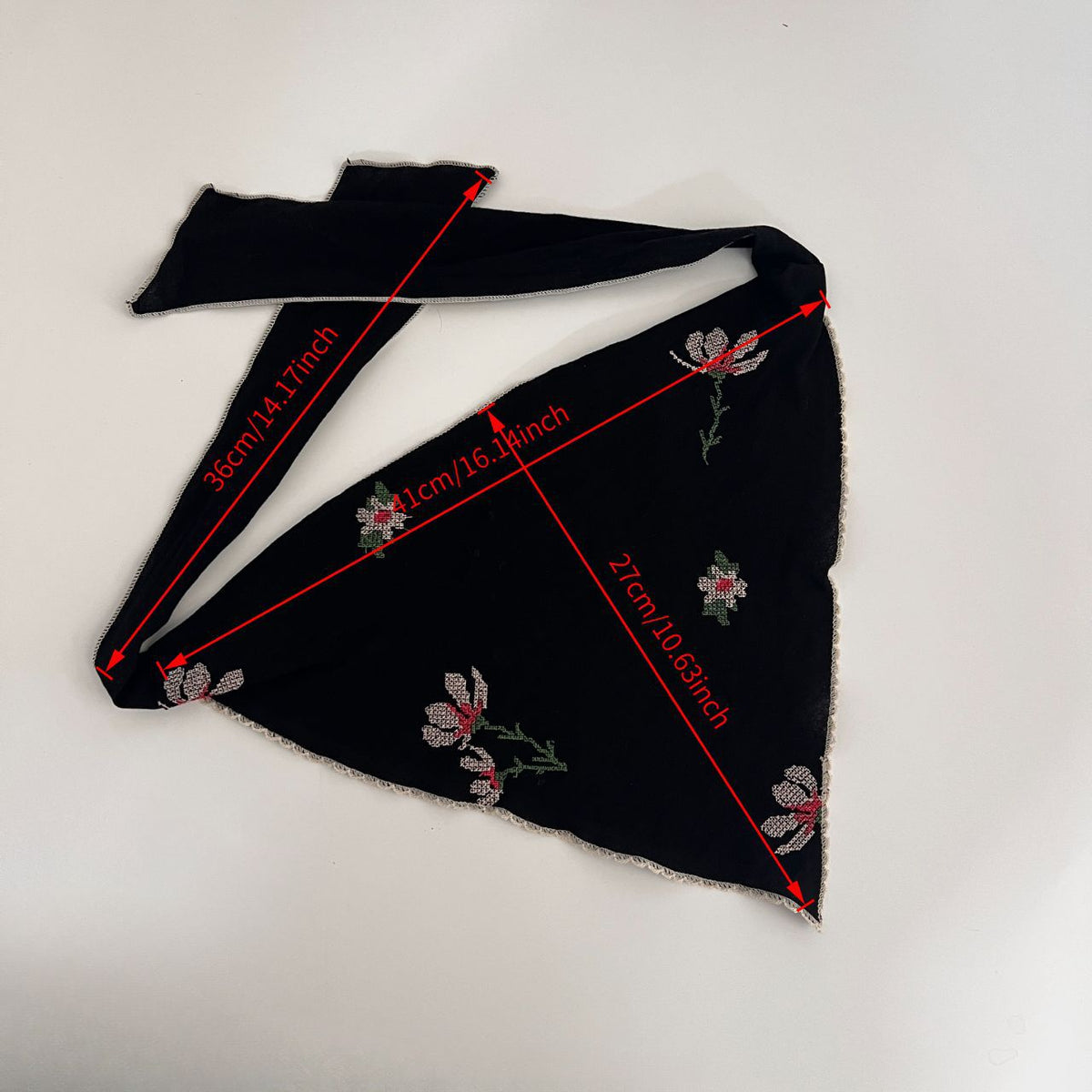 Triangle headscarf with small floral sprigs and a scalloped lace edge
