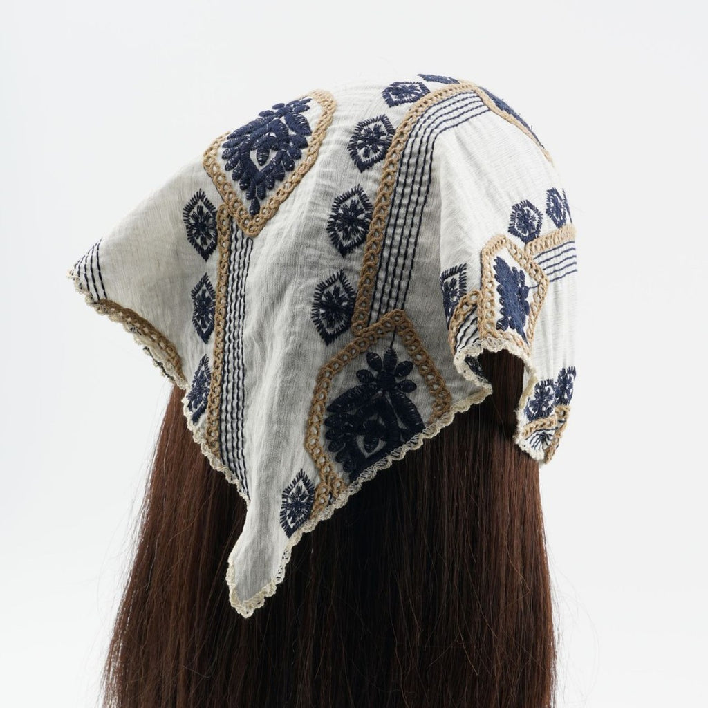 Ivory triangle headscarf with navy geometric embroidery and fabric ties