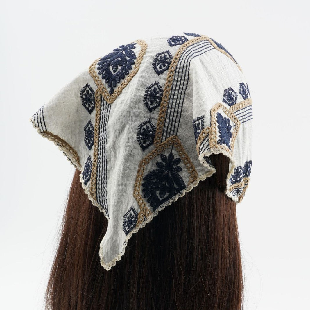 Ivory triangle headscarf with navy geometric embroidery and fabric ties