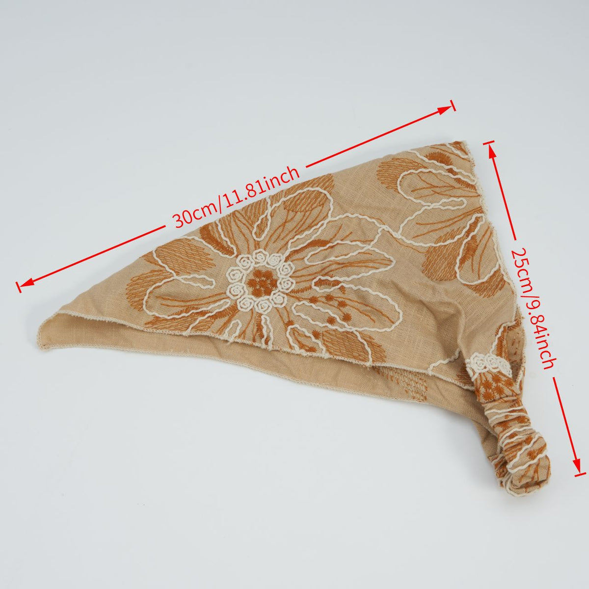 Camel triangle headscarf with rust floral embroidery and a gathered elastic back