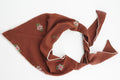 Triangle headscarf with small floral sprigs and a scalloped lace edge