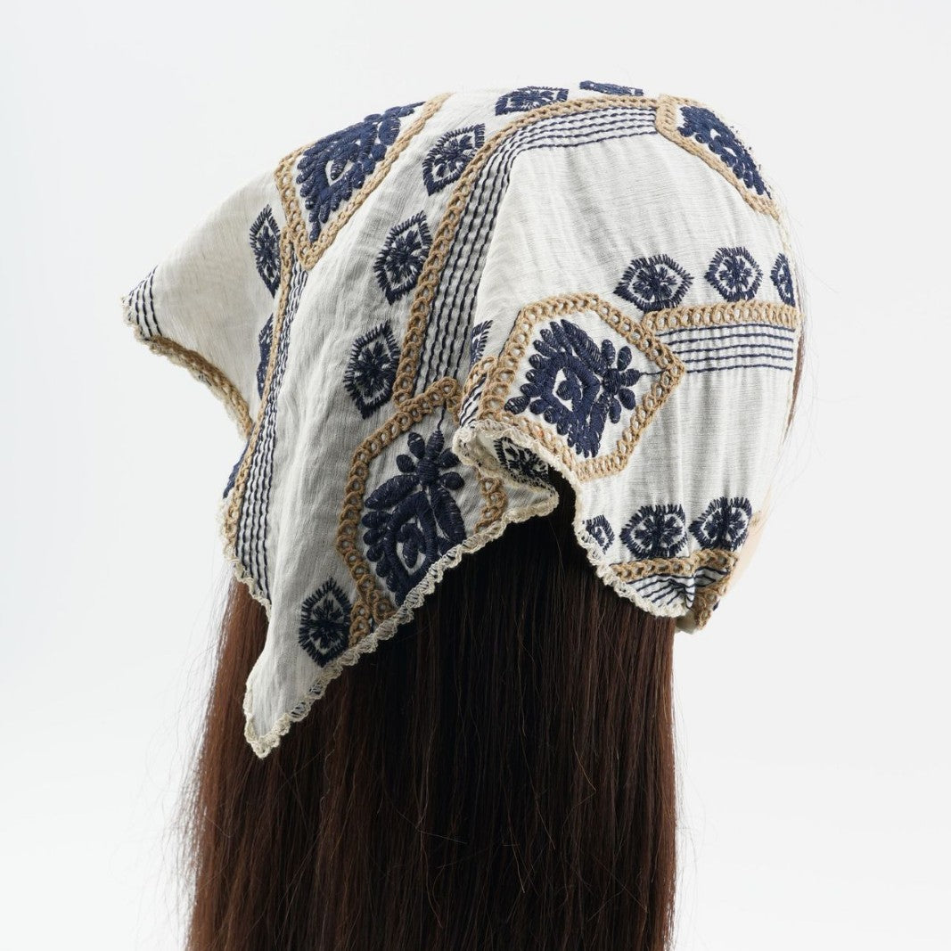 Ivory triangle headscarf with navy geometric embroidery and fabric ties