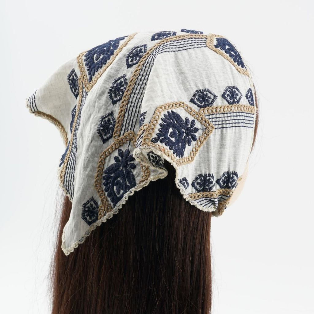 Ivory triangle headscarf with navy geometric embroidery and fabric ties