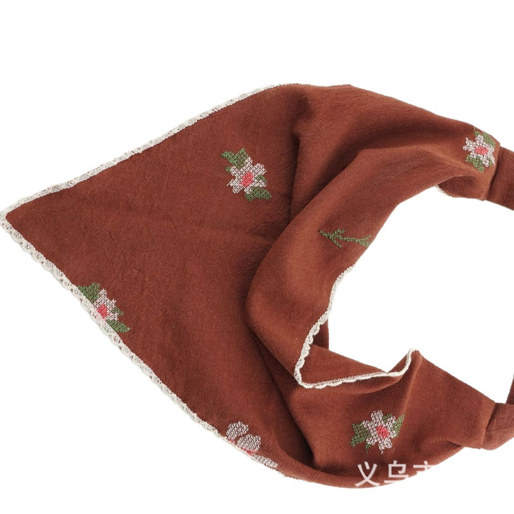 Triangle headscarf with small floral sprigs and a scalloped lace edge
