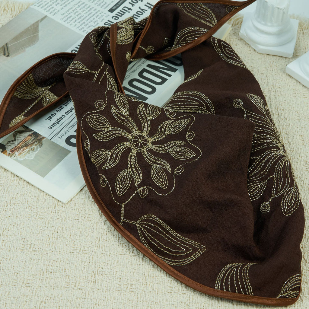 Dark brown triangle headscarf with gold floral embroidery and satin edge