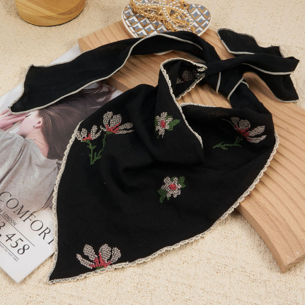 Triangle headscarf with small floral sprigs and a scalloped lace edge